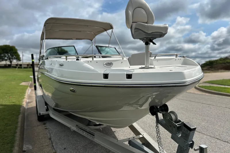 Slide: The Image of 2017 Hurricane SD 2486 boat on trailer with Suzuki outboard motor. - 6