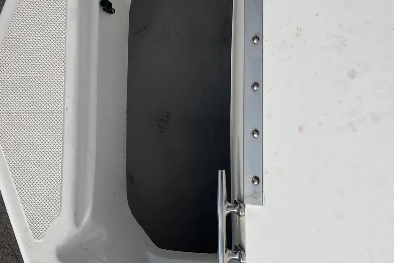 Slide: The Image of 2017 Hurricane SD 2486 boat interior with white seating and wood-style flooring. - 63