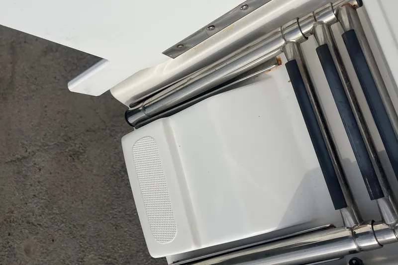 Slide: The Image of 2017 Hurricane SD 2486 boat deck with metal fittings and textured surface. - 64