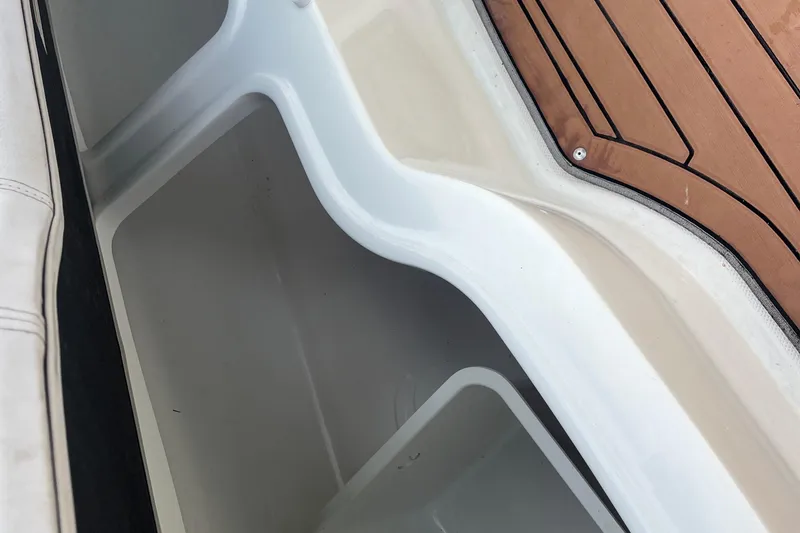 Slide: The Image of Close-up of a 2017 Hurricane SD 2486 boat's white surface with spiral design. - 68