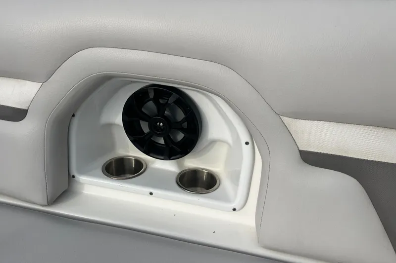 Slide: The Image of 2017 Hurricane SD 2486 boat interior with white seating and wooden flooring detail. - 69