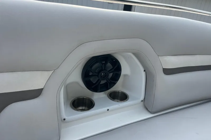 Slide: The Image of 2017 Hurricane SD 2486 boat interior with speaker and cup holders. - 70