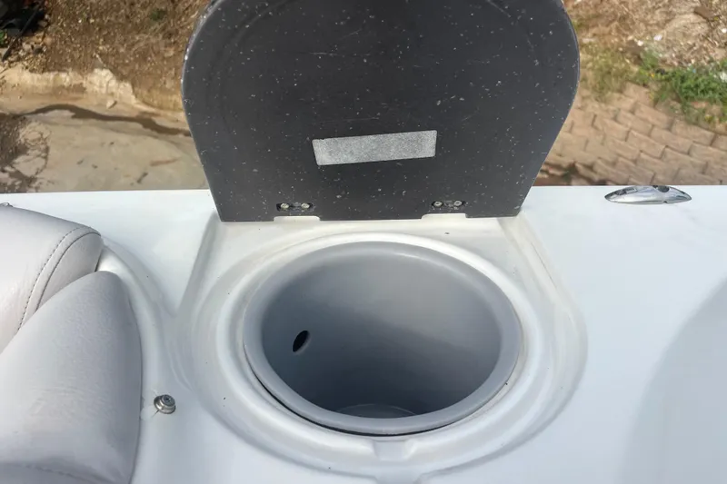 Slide: The Image of 2017 Hurricane SD 2486 boat interior with speaker and cup holders. - 71