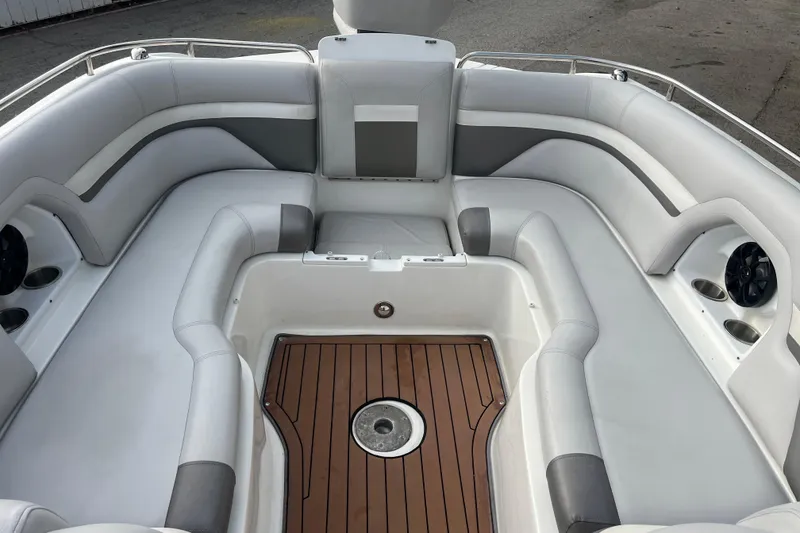 Slide: The Image of Interior of 2017 Hurricane SD 2486 boat with white seating and wood-style flooring. - 73