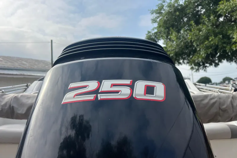 Slide: The Image of Control panel on a 2017 Hurricane SD 2486 boat dashboard. - 75