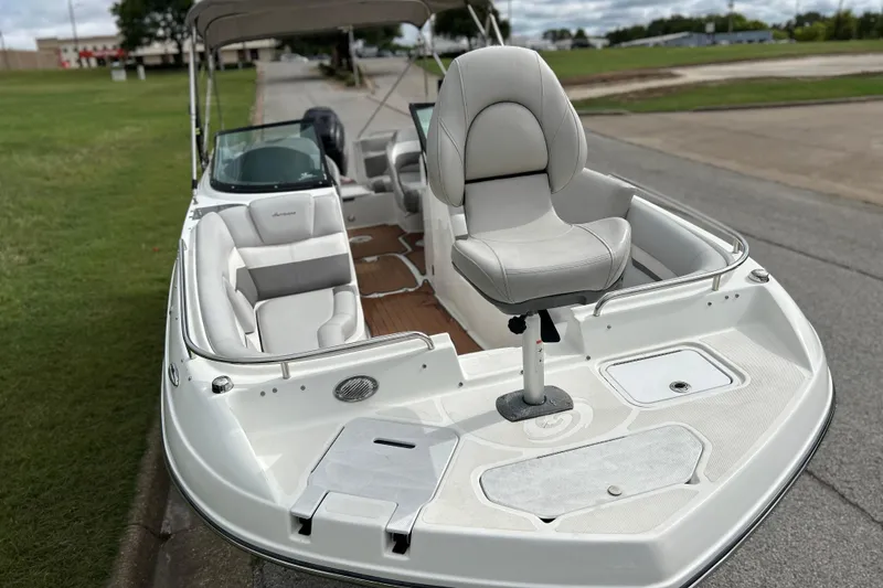 Slide: The Image of 2017 Hurricane SD 2486 boat on trailer, parked on roadside with green grass background. - 77