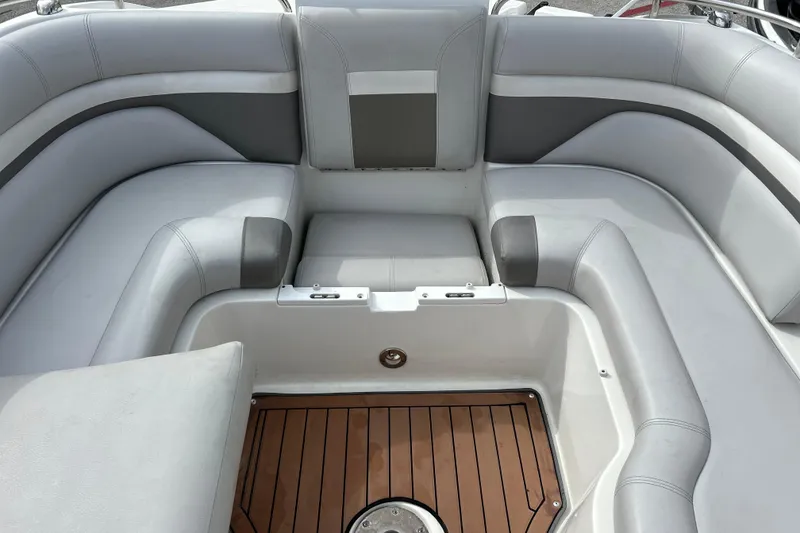 Slide: The Image of 2017 Hurricane SD 2486 boat interior with seating and wooden flooring. - 80