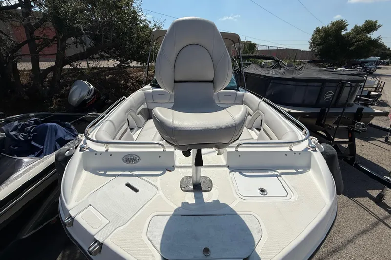 Slide: The Image of Close-up of 2017 Hurricane SD 2486 trailer wheels on asphalt surface. - 87