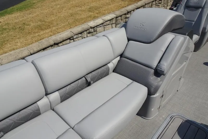 Slide: The Image of 2024 Regency 250 LE3 boat seating with luxurious gray upholstery. - 26