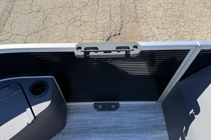 Slide: The Image of 2026 Bennington 168 SF Electric boat interior with cup holder and textured flooring. - 10