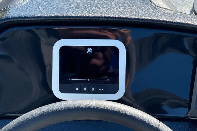 Slide: The Image of 2026 Bennington 168 SF Electric dashboard with digital display and control buttons. - 18