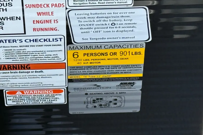 Slide: The Image of Bennington 168 SF Electric 2026 safety and capacity labels, including warnings and maximum load information. - 22