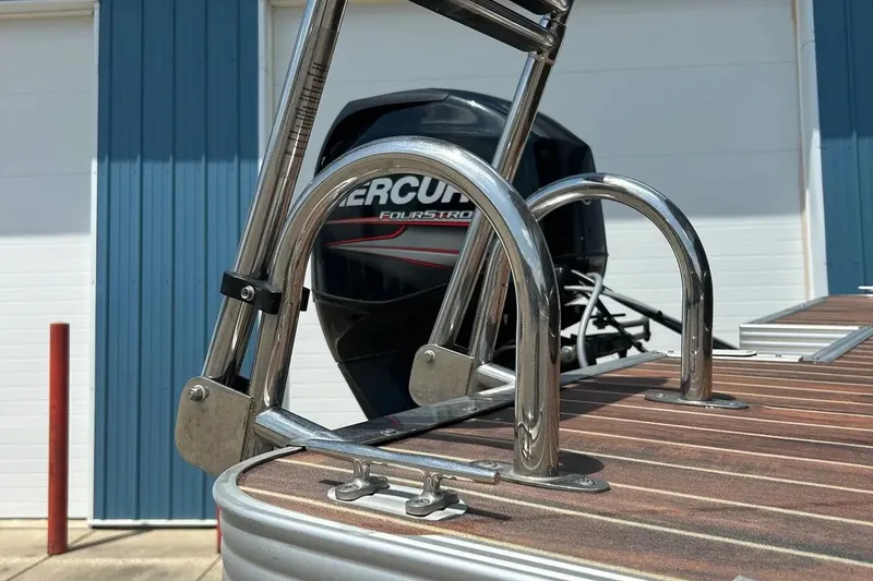 Slide: The Image of 2014 Crest 230 Crest II SLC boat with Mercury FourStroke engine and stainless steel ladder. - 10