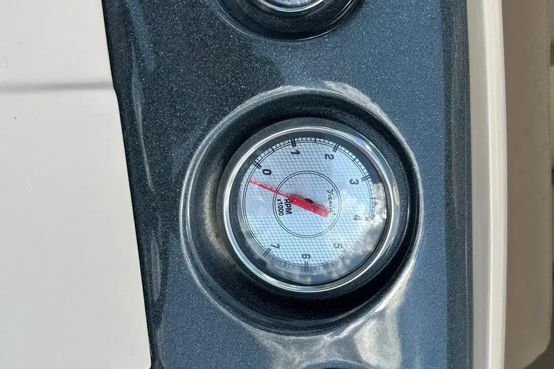 Slide: The Image of Tachometer of 2014 Crest 230 Crest II SLC boat, showing RPM gauge. - 24