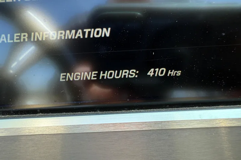 Slide: The Image of Display showing 410 engine hours on 2019 MasterCraft XT22 boat. - 16