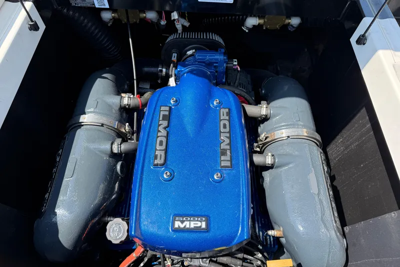 Slide: The Image of 2019 MasterCraft XT22 engine with blue Ilmor 5000 MPI cover. - 26