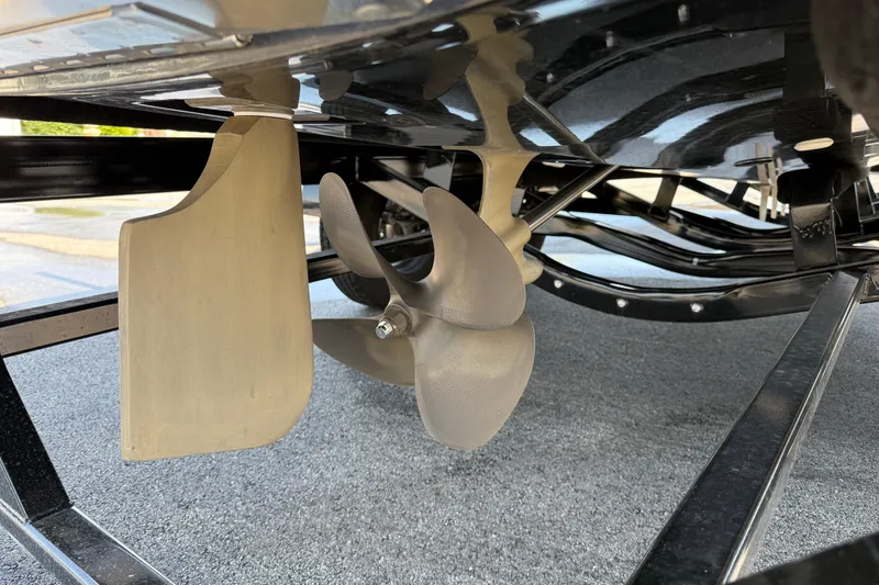 Slide: The Image of 2019 MasterCraft XT22 boat propeller and rudder detail, showcasing sleek design and engineering. - 4