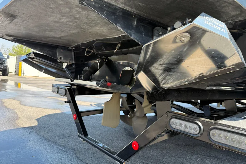 Slide: The Image of 2019 MasterCraft XT22 boat underside with propeller and trailer details. - 5