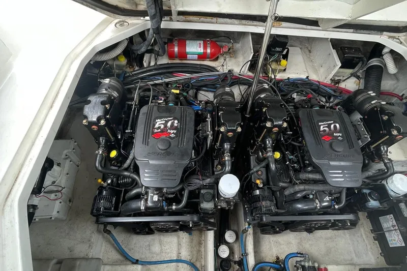 Slide: The Image of Engine compartment of a 2007 Sea Ray 290 Sundancer with twin MerCruiser 5.0 MPI engines. - 19