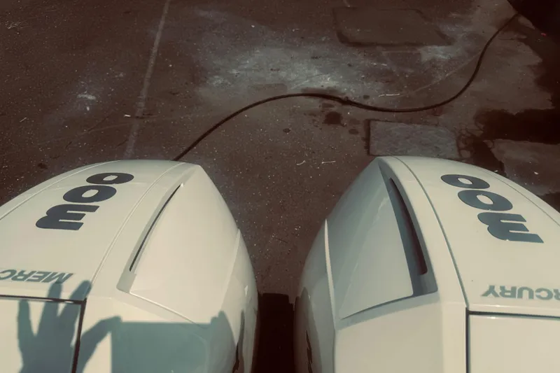 Slide: The Image of Twin Mercury 300 outboard engines on a 2020 Boston Whaler 270 Vantage boat. - 10