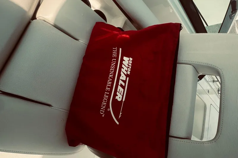 Slide: The Image of Red Boston Whaler bag on 2020 270 Vantage boat seat. - 26