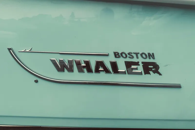 Slide: The Image of Boston Whaler 270 Vantage 2020 logo on a light blue boat surface. - 6
