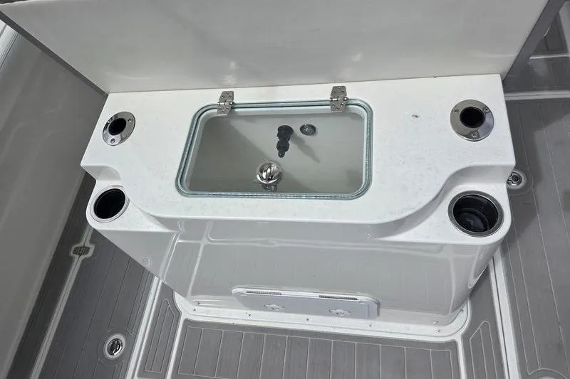 Slide: The Image of 2023 Parker 2600 Center Console boat with integrated livewell and cup holders. - 10