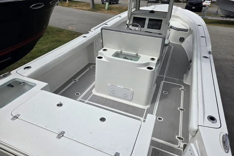 Slide: The Image of 2023 Parker 2600 Center Console boat with spacious deck and modern design. - 8