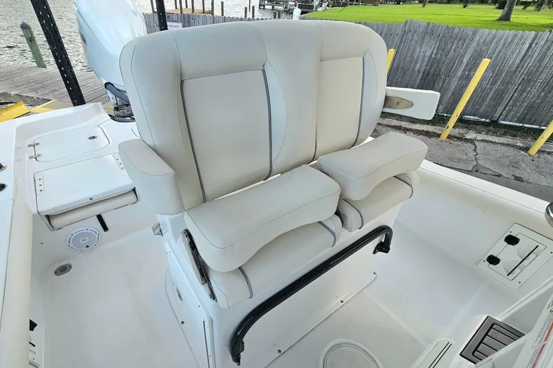 Slide: The Image of 2023 Sea Hunt BX 25 FS boat with comfortable dual seating and sleek design. - 16