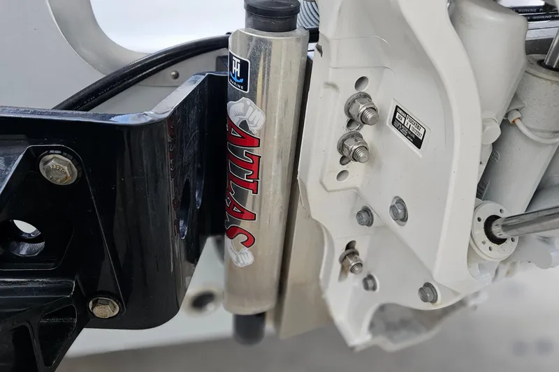 Slide: The Image of Close-up of 2023 Sea Hunt BX 25 FS boat's Atlas hydraulic jack plate. - 5