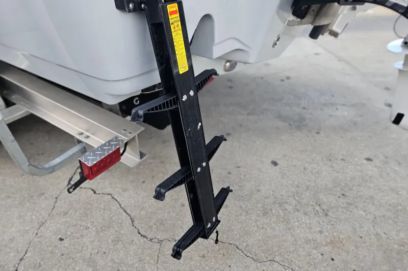 Slide: The Image of 2023 Sea Hunt BX 25 FS boat ladder and trailer detail. - 6