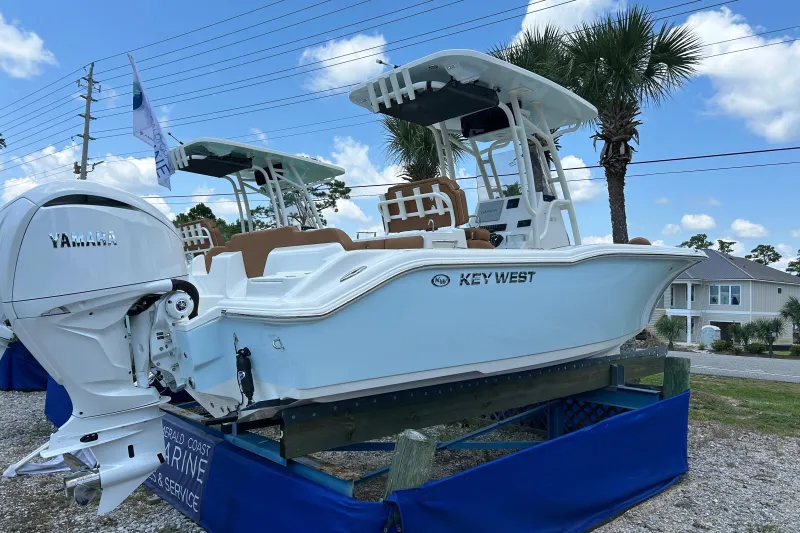 Slide: The Image of 2026 Key West 239 FS boat with Yamaha engine on display outdoors. - 3