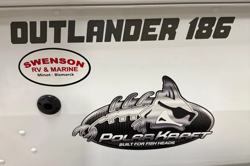 Slide: The Image of 2024 Polar Kraft Outlander 186 SC boat with Swenson RV & Marine logo. - 4
