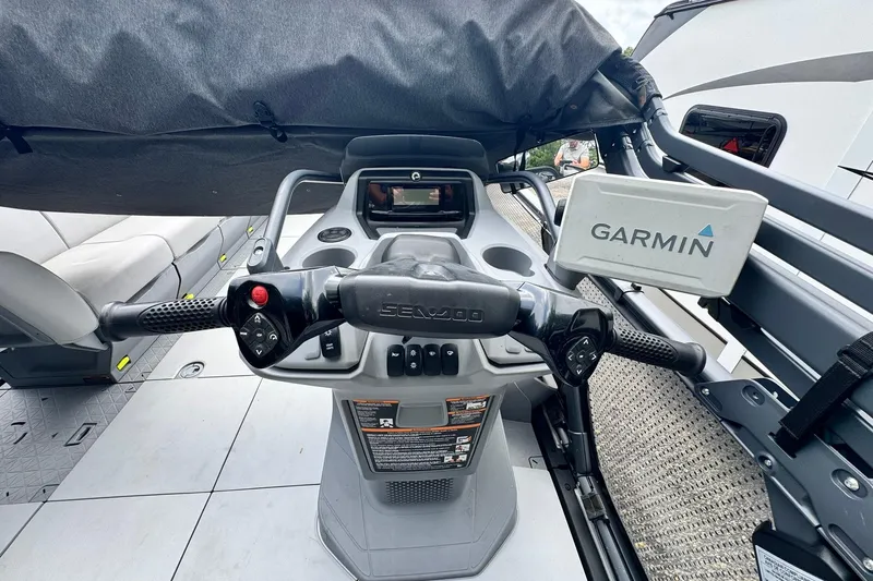 Slide: The Image of 2023 Sea-Doo Switch Cruise 21 dashboard with Garmin navigation system. - 14