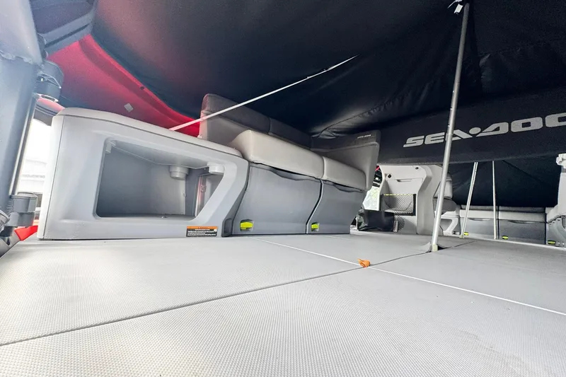 Slide: The Image of 2023 Sea-Doo Switch Cruise 21 interior with seating and storage compartments. - 9