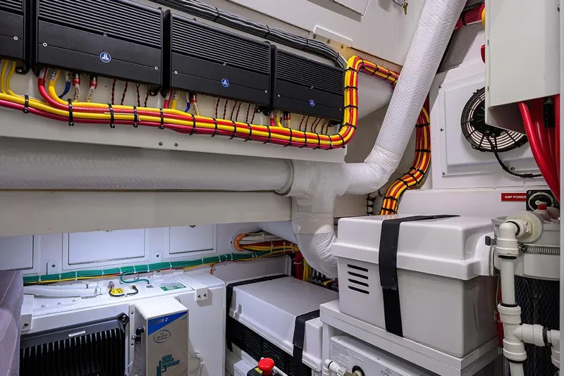 Slide: The Image of 2026 Valhalla V-46 engine room with organized wiring and modern equipment. - 35