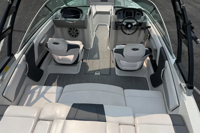 Slide: The Image of 2020 Chaparral 21 Surf boat interior with modern seating and dashboard. - 29