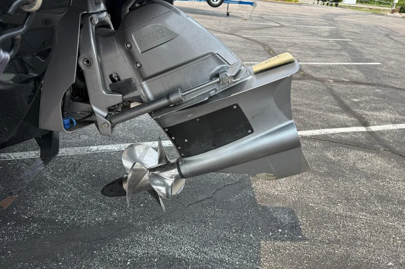 Slide: The Image of 2020 Chaparral 21 Surf boat with Volvo Penta outdrive and propeller in a parking lot. - 5