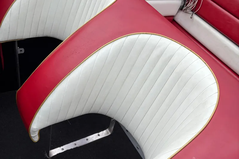 Slide: The Image of Red and white boat seat from a 1988 Fountain 38 model. - 9