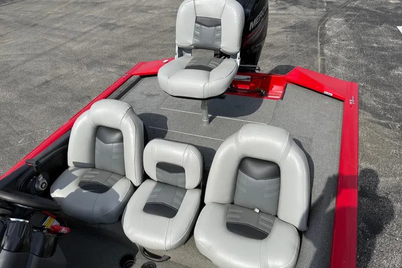 Slide: The Image of 2018 Tracker Pro Team 175 TXW boat with gray seating and red accents. - 19
