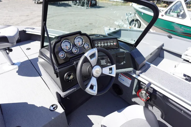 Slide: The Image of 2025 G3 Angler V1750SF boat dashboard with steering wheel and instrument panel. - 10