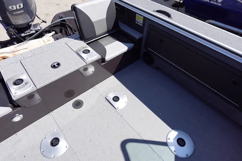 Slide: The Image of 2025 G3 Angler V1750SF boat interior with Yamaha 90 engine, featuring seating and storage. - 11