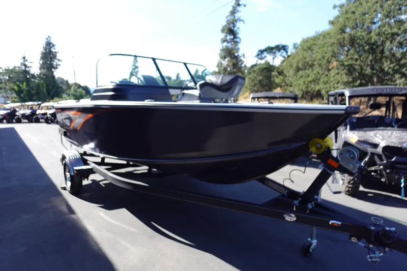 Slide: The Image of 2025 G3 Angler V1750SF boat on trailer, parked outdoors. - 17