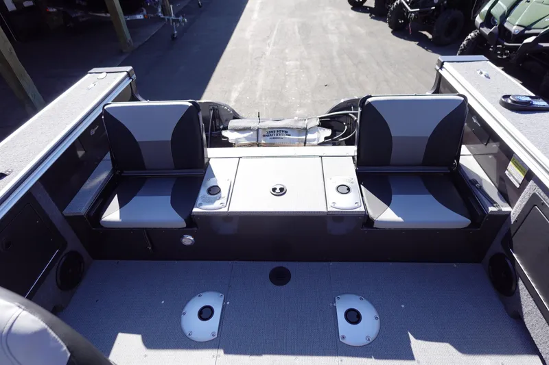 Slide: The Image of 2025 G3 Angler V1750SF boat interior with dual seats and storage compartments. - 22