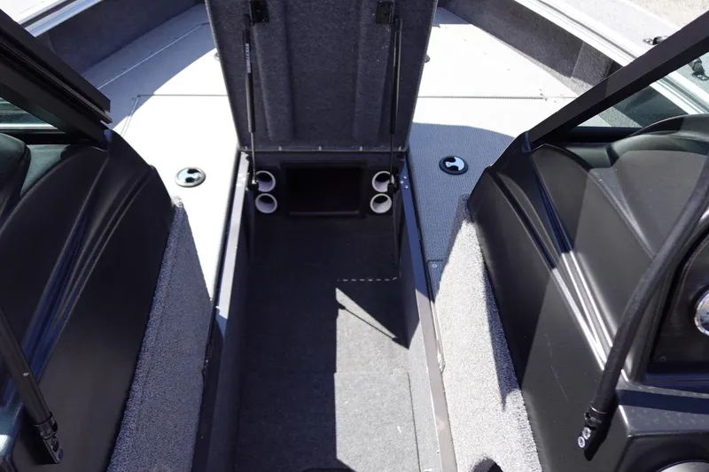 Slide: The Image of 2025 G3 Angler V1750SF boat interior with open storage compartment and seating. - 24
