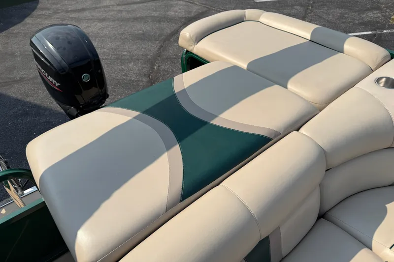 Slide: The Image of 2012 Bentley Pontoons 220 Cruise with beige and green seating, Mercury outboard motor. - 12