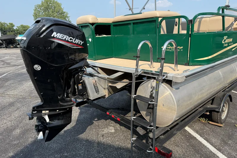 Slide: The Image of 2012 Bentley Pontoons 220 Cruise with Mercury outboard motor on trailer. - 21