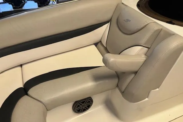 Slide: The Image of 2022 Starcraft Starstep 221 boat interior with beige and black seating. - 18