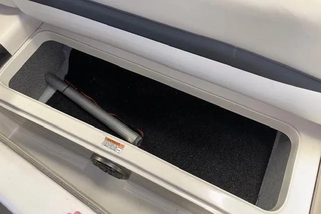 Slide: The Image of Storage compartment in 2022 Starcraft Starstep 221 boat, featuring a clean interior. - 31