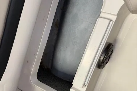 Slide: The Image of 2022 Starcraft Starstep 221 boat storage compartment with speaker detail. - 33